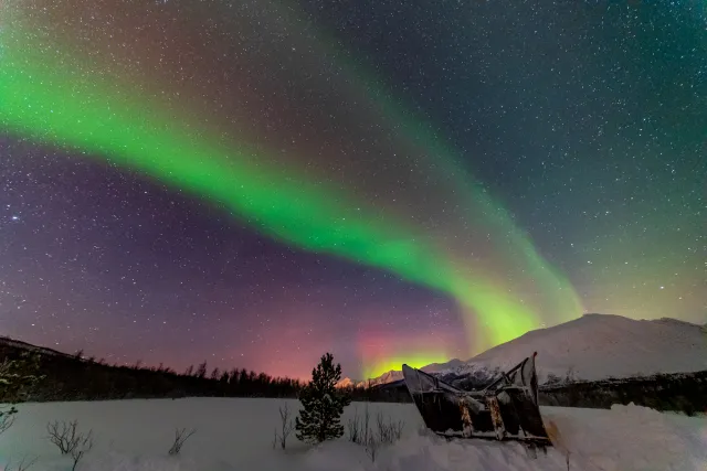 Northern lights over the Lyngenfjord Alps