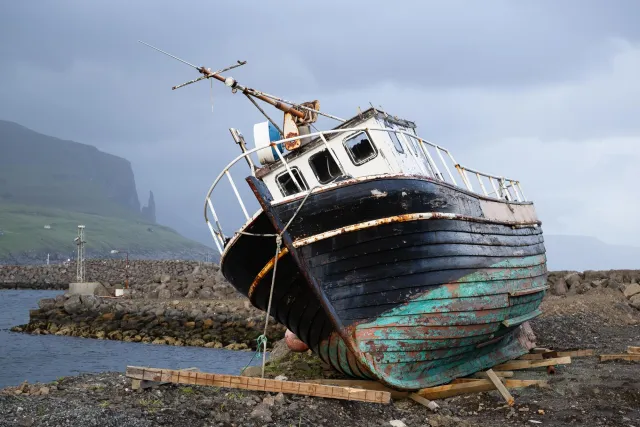 Shipwreck in the harbor of Miðvágur