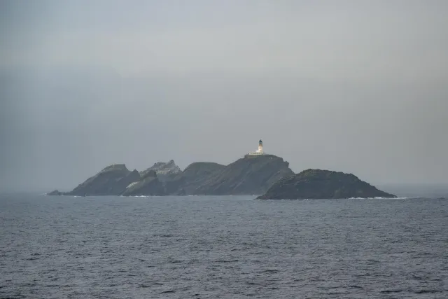 The Muckle Flugga lighthouse with the gannet colony
